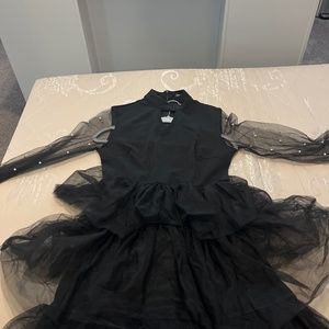 Black sheer peplum drsss